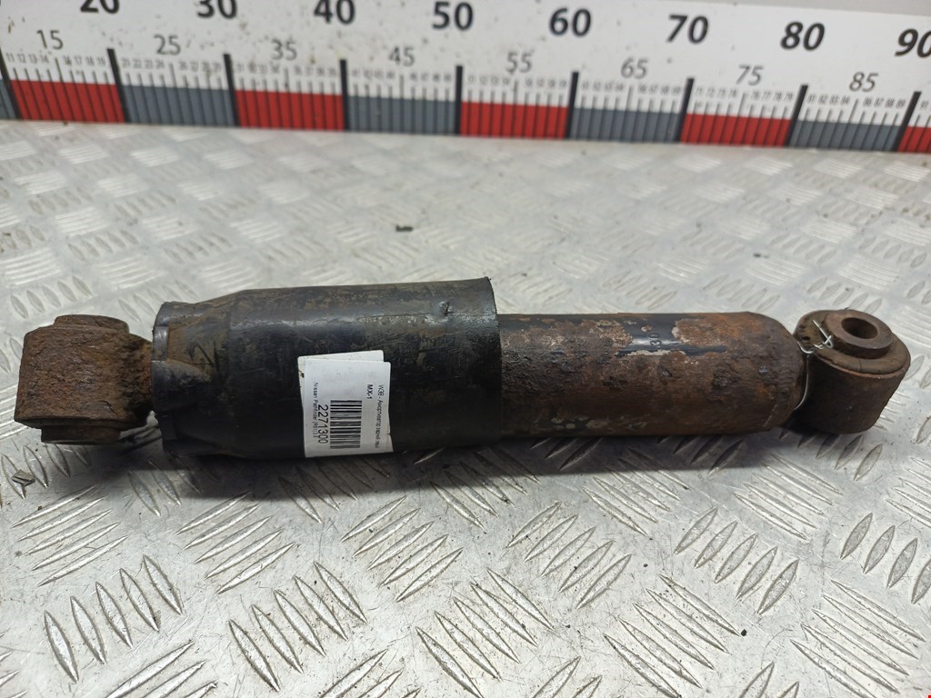 Амортизатор задний левый NISSAN Pathfinder R51M 2004-2014