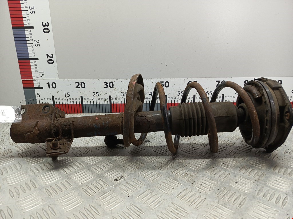 Амортизатор передний правый Nissan Note (E11) (2005-2013)