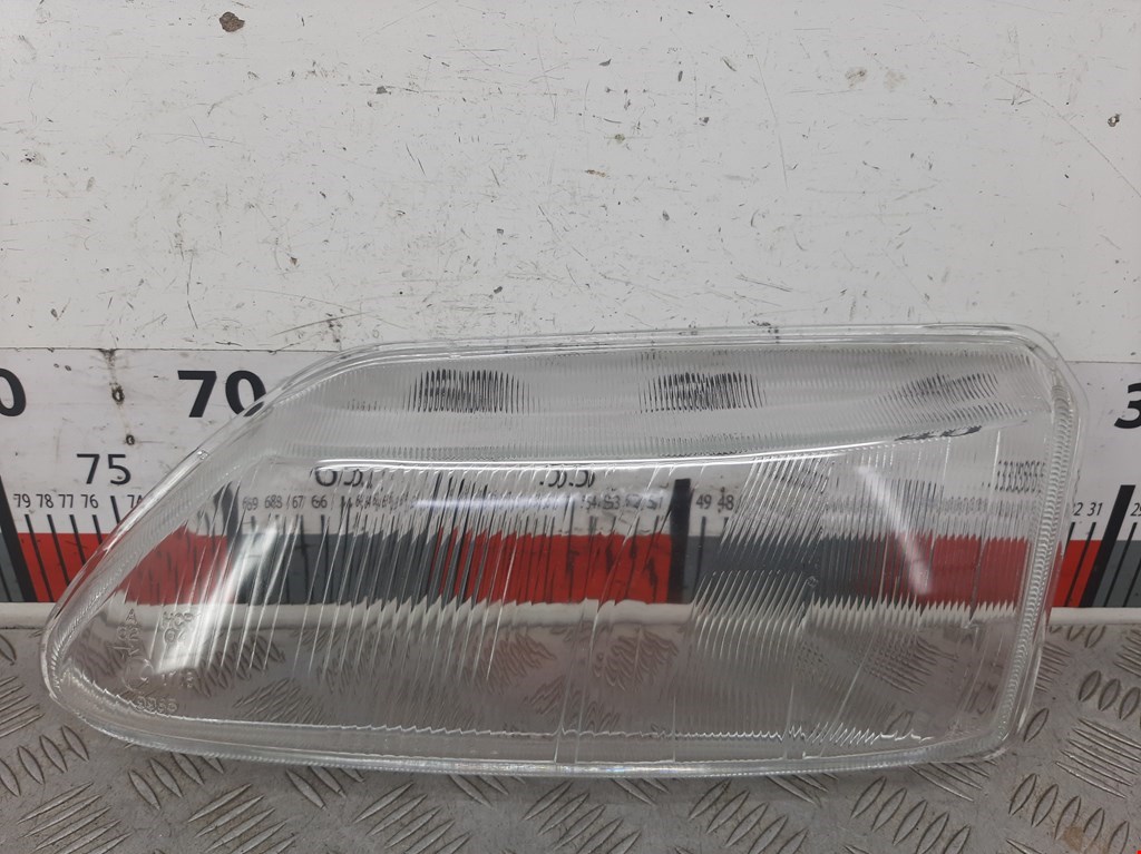 Стекло фары левой Renault Laguna 1 (1993-2000)