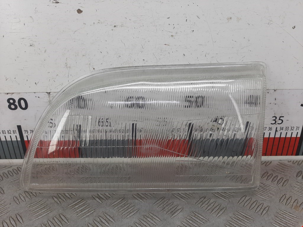 Стекло фары левой Ford Transit 3 (1986-2000)